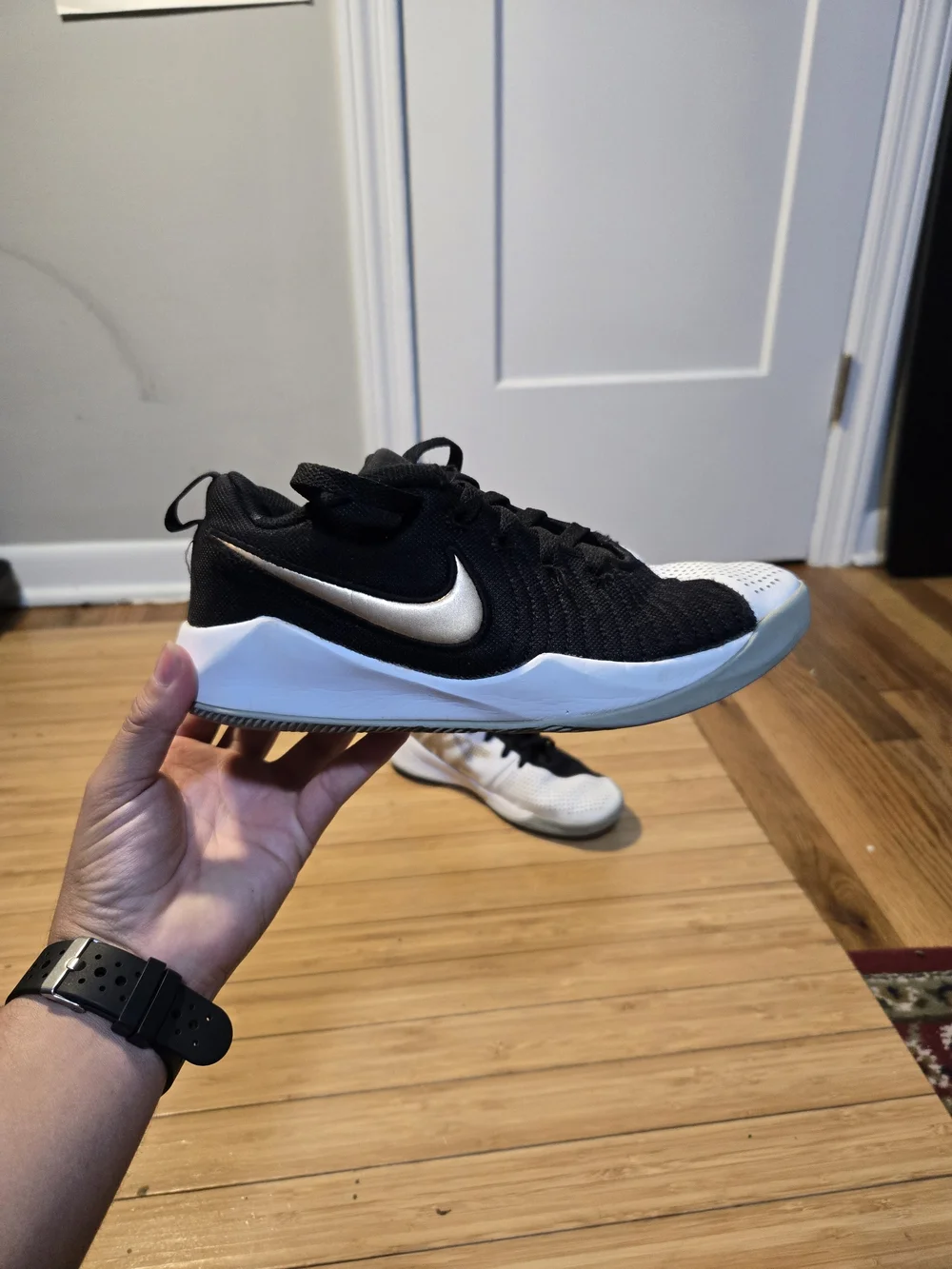 Nike Boy Black and White Basketball Shoes with Gold Accents